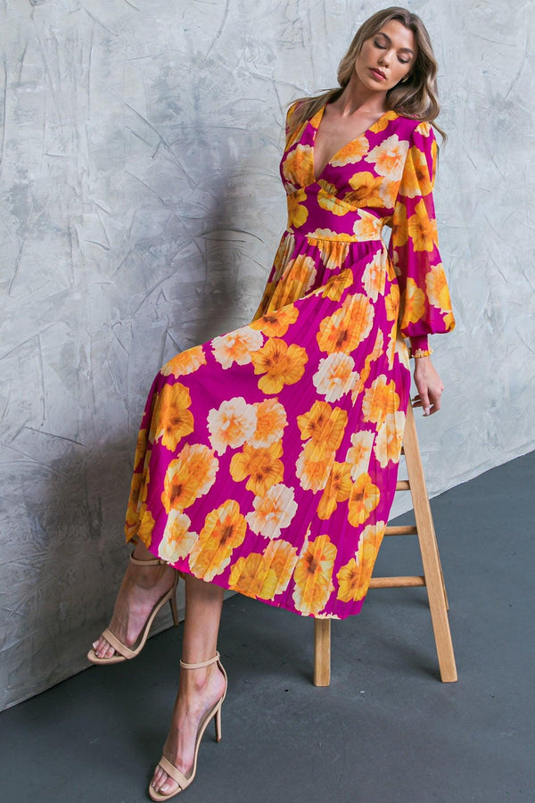 LOOK AT HER FLORAL WOVEN MIDI DRESS.