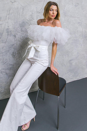 A POWER MOOD WHITE DENIM JUMPSUIT.
