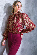 BEYOND COMPARE SEMI-SHEER TOP.