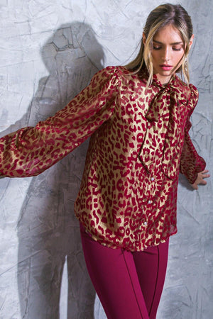 BEYOND COMPARE SEMI-SHEER TOP.