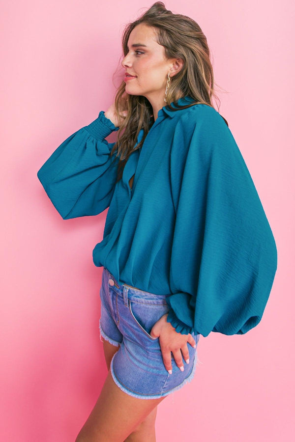 MILES BETWEEN US WOVEN TOP.