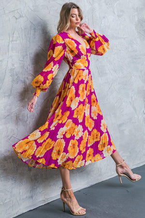 LOOK AT HER FLORAL WOVEN MIDI DRESS.