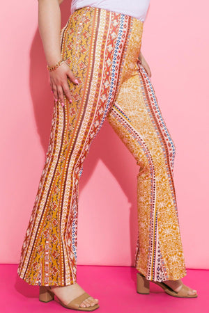 STATE OF BALANCE WOVEN FLARE PANTS.