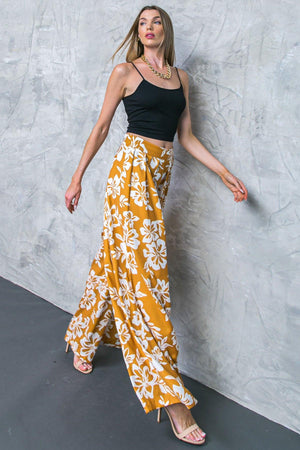 LET THE LIGHT IN BROWN WOVEN PANTS.