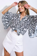 PRETTY ON POINT WOVEN TOP.