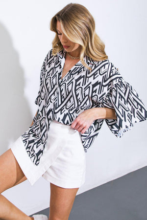 PRETTY ON POINT WOVEN TOP.