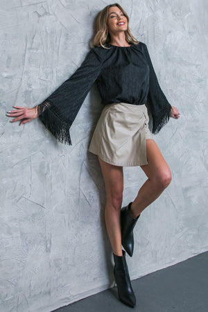 A STEP AHEAD FAUX LEATHER SKORT.