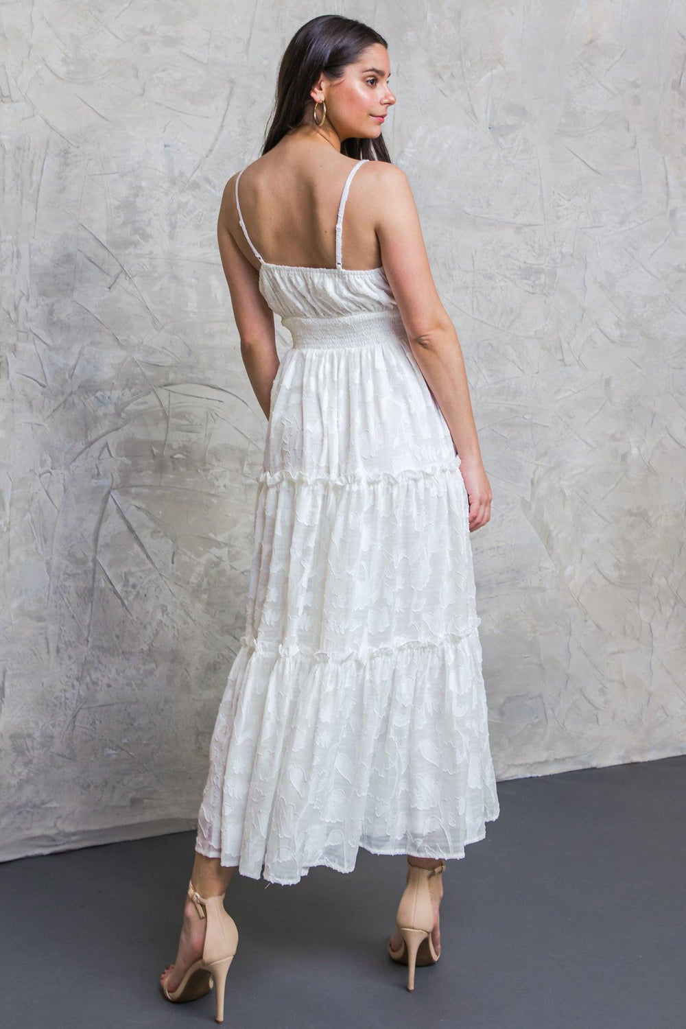 White long dress with knot-tie in the front on a white background | Flying Tomato