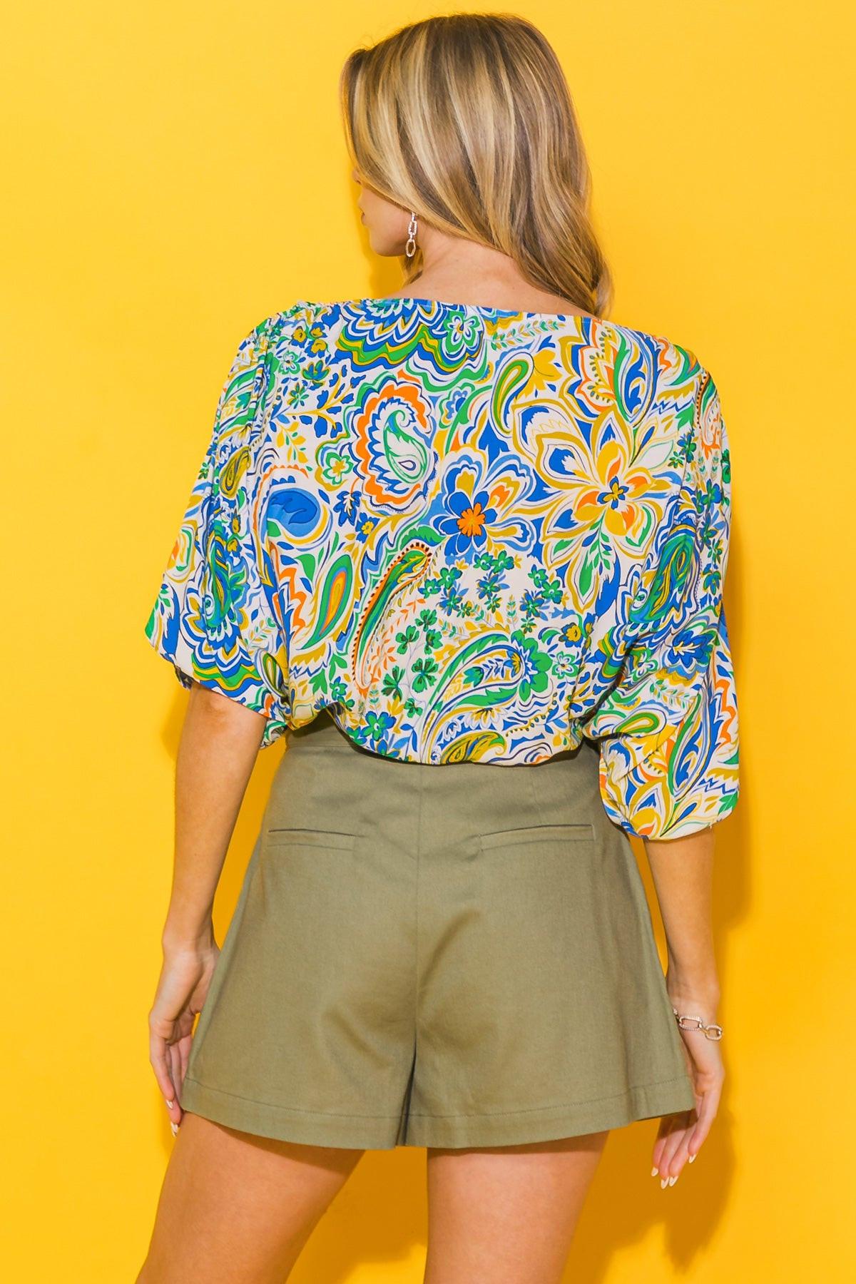 STAND OUT WOVEN BODYSUIT.