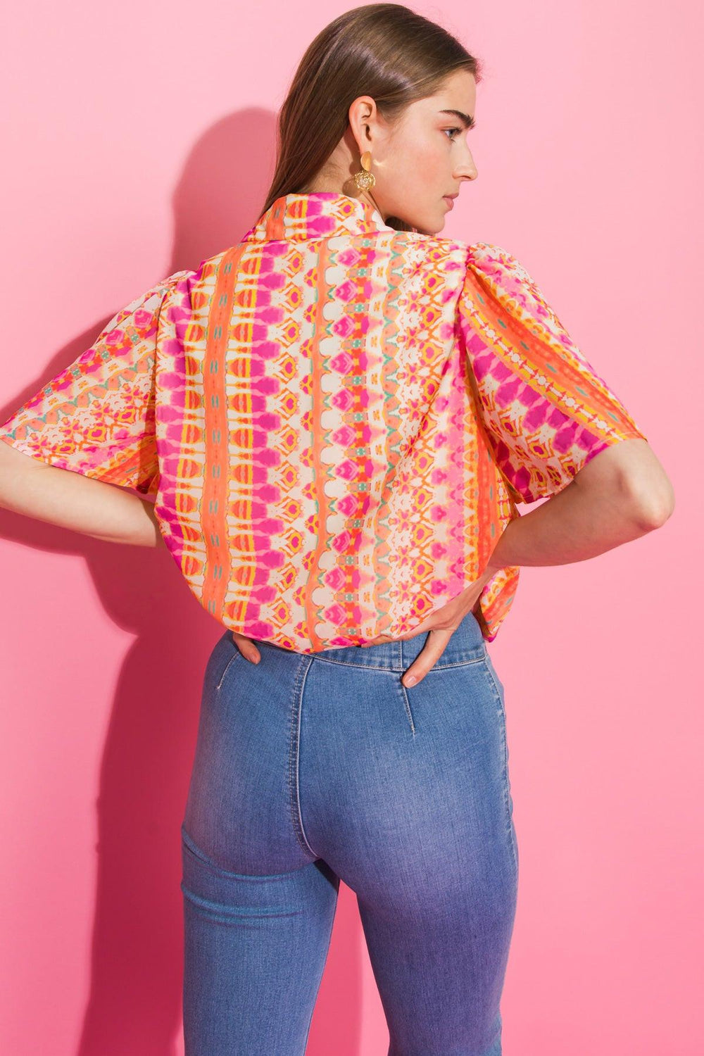 THE STORY CONTINUES WOVEN TOP.