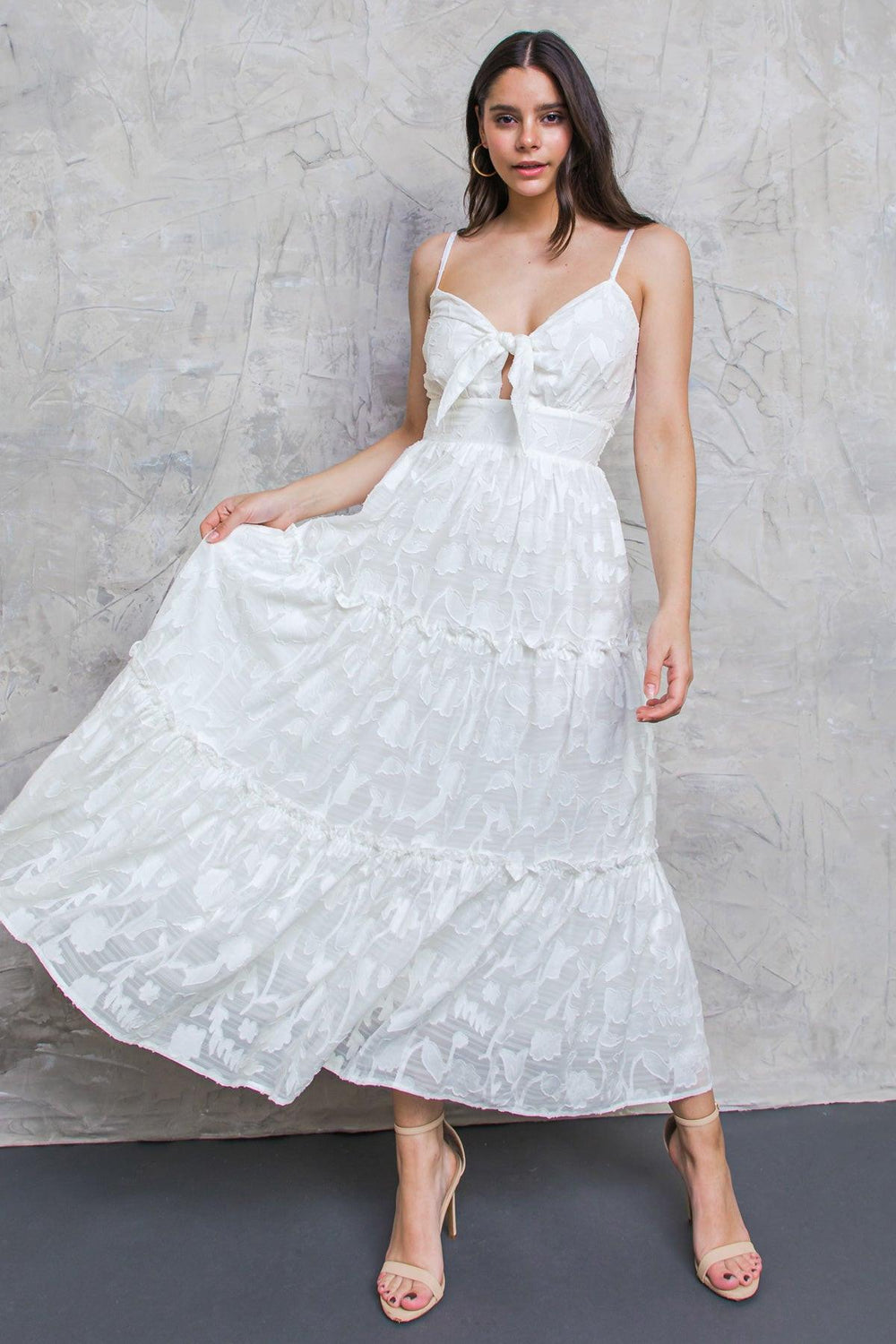 White long dress with knot-tie in the front on a white background | Flying Tomato