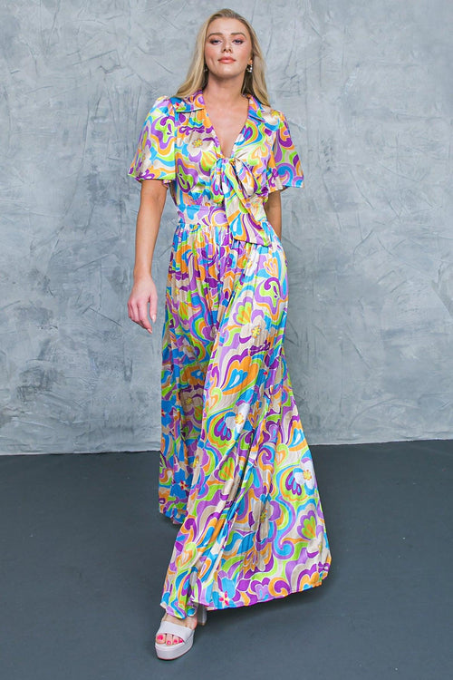 A SECRET PLACE WOVEN JUMPSUIT.