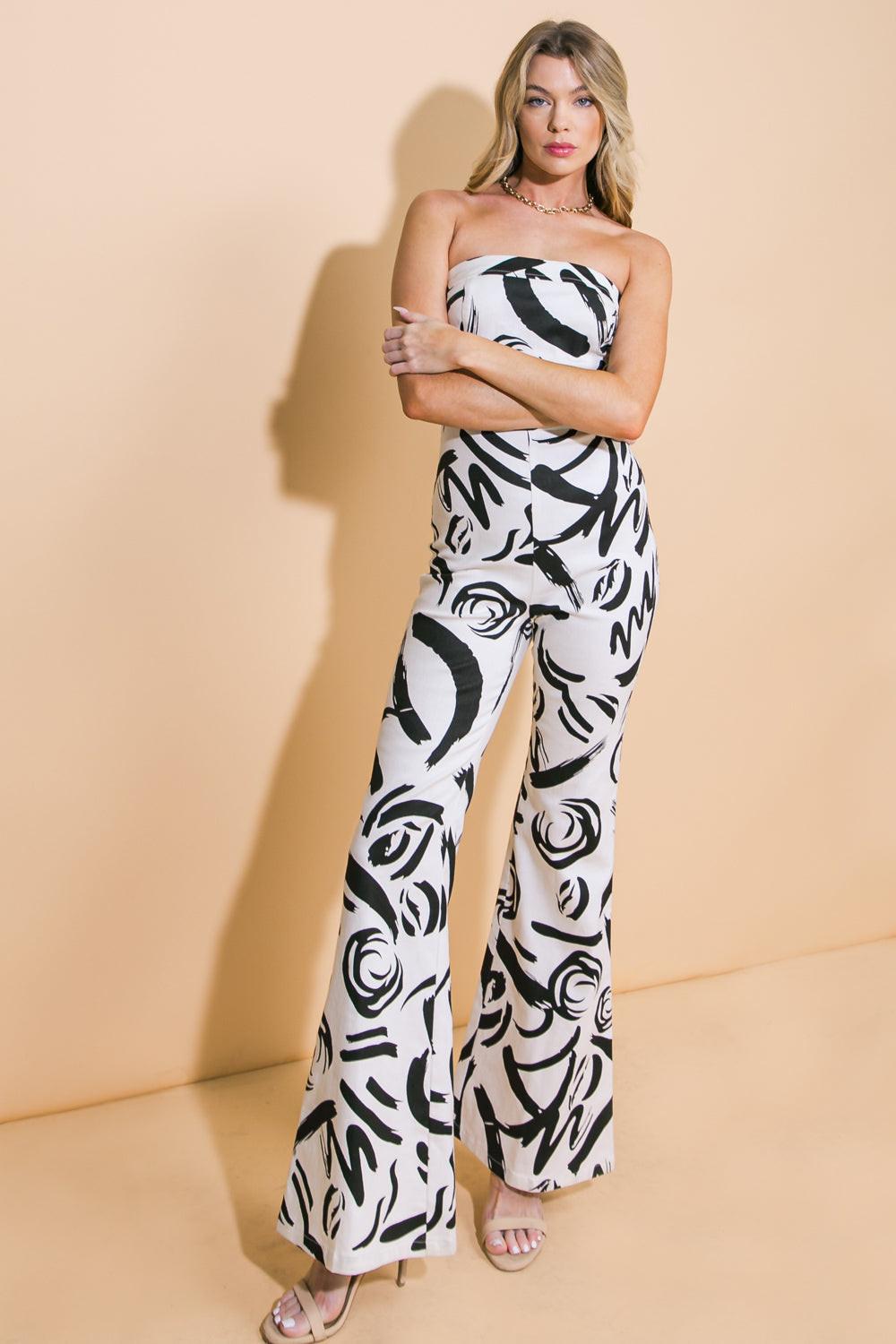 BIG AMBITIONS TWILL JUMPSUIT.