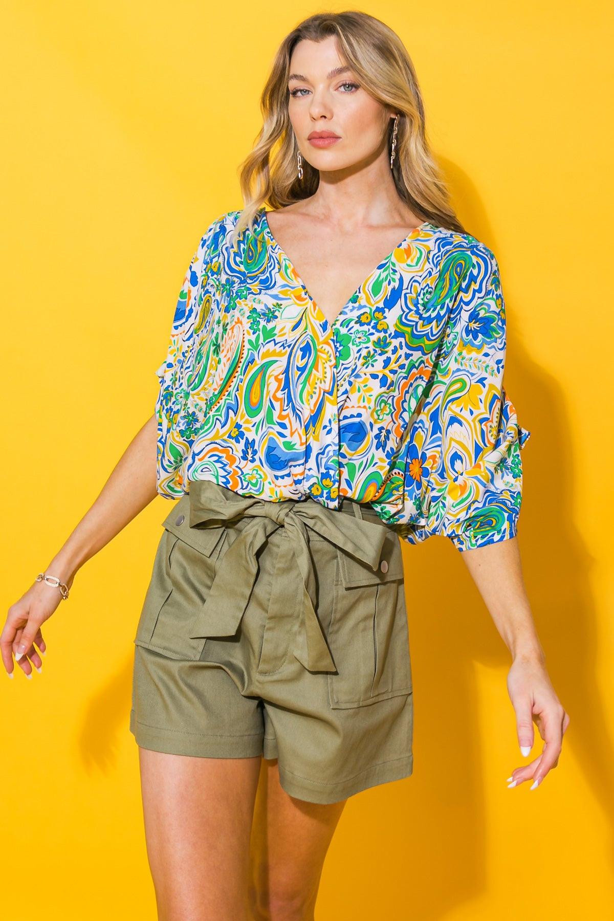 STAND OUT WOVEN BODYSUIT.