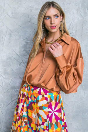 GRACEFUL MOVEMENTS WOVEN TOP.