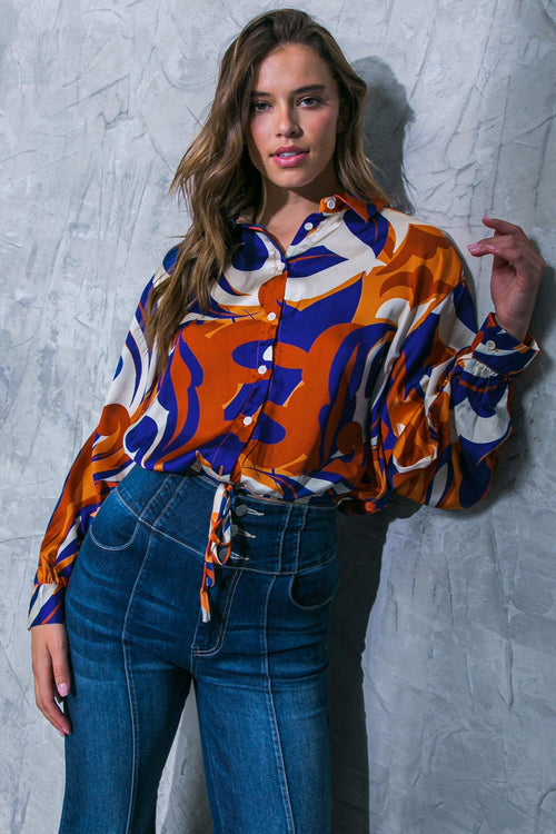 COME AROUND TO YOU WOVEN TOP.