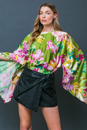 EXTRAVAGANT PRESENCE WOVEN TOP.