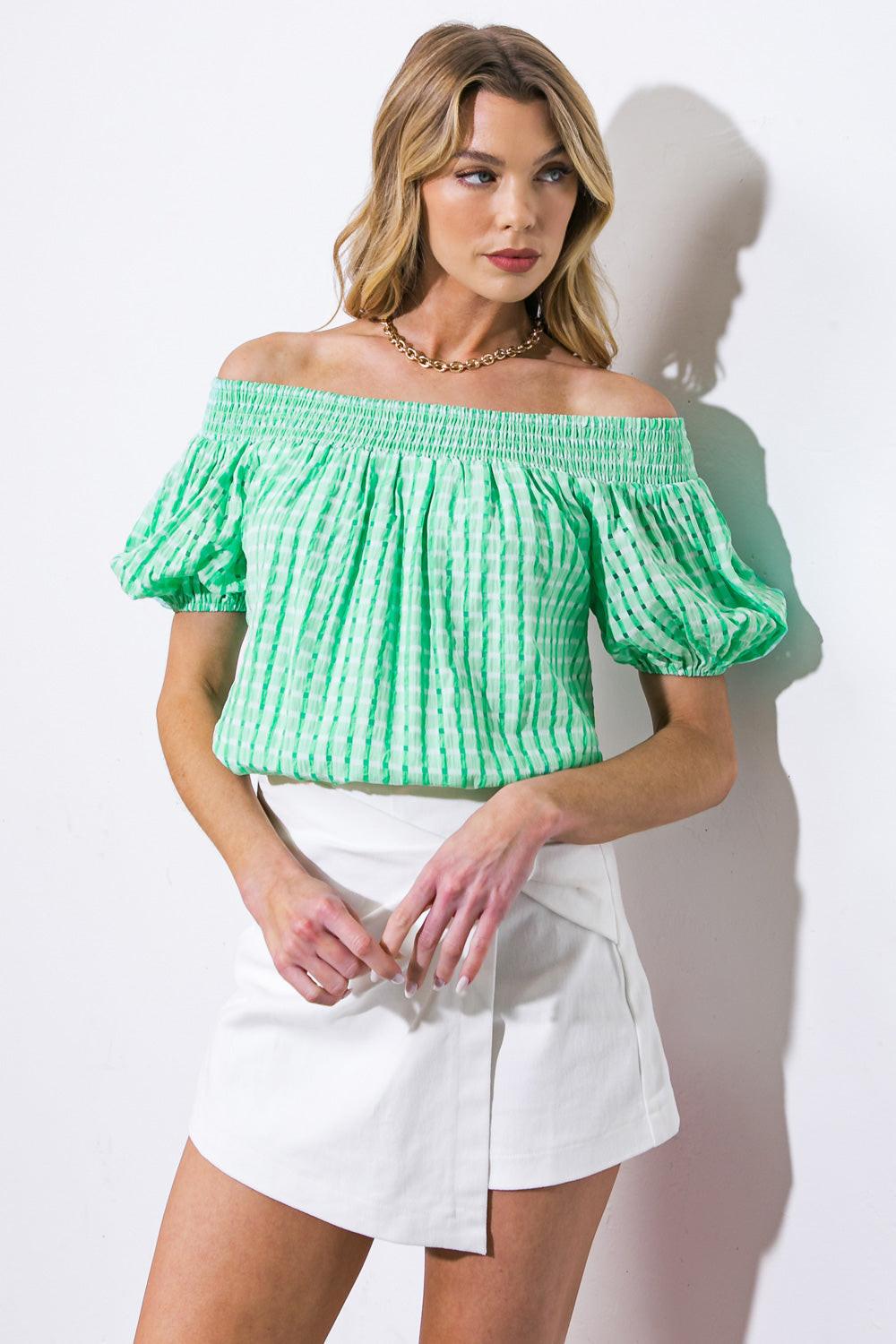 Indulge in the exquisite craftsmanship of this woven top, featuring a shirred off-the-shoulder neckline and delicate, puffed sleeves.
Details:
Self : 47% Polyester 43% Rayon 10% Nylon
Lining : 100% Polyester
Size & Fit
- Model is 5`8" And Wearing Size Small
- Measurements Taken From Size Small
- Approx. Length: 19"
