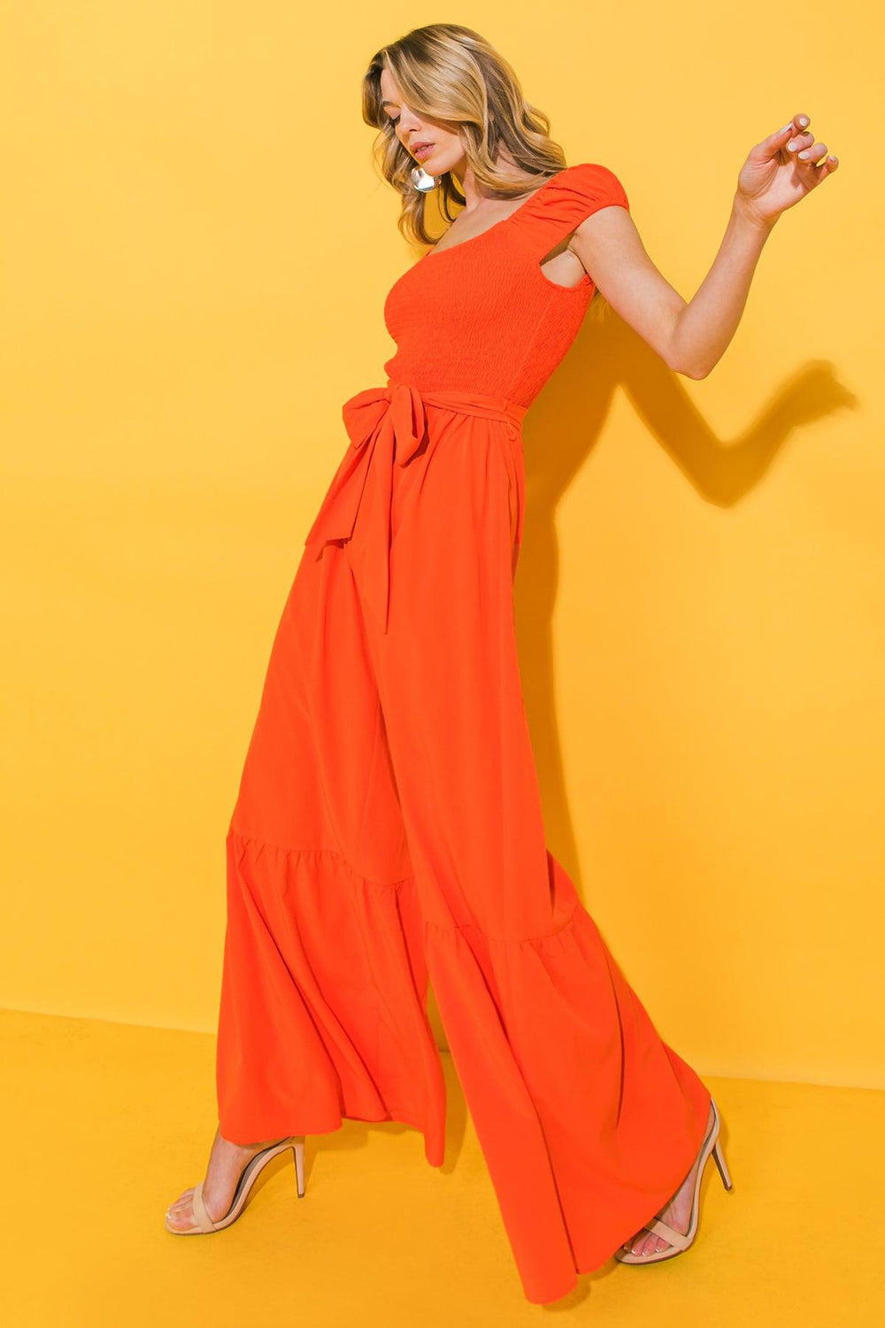 SMILE AFTERNOON IN WOVEN JUMPSUIT.