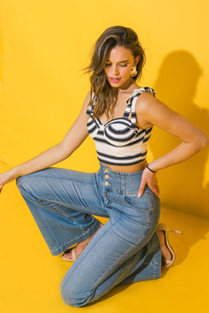 ALL ABOUT LOVE WOVEN TOP.