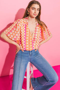 THE STORY CONTINUES WOVEN TOP.