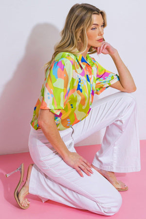 UP FOR ANYTHING WOVEN TOP.