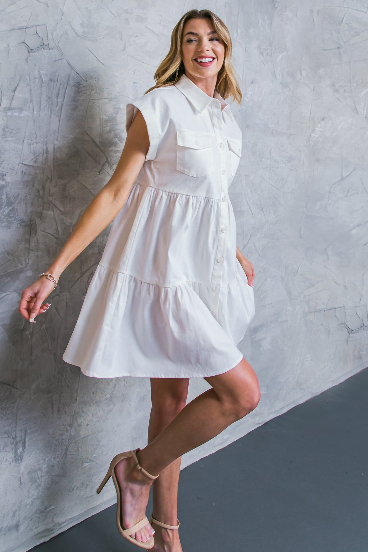 Our LIVE IN THE MOMENT Denim Mini Dress is crafted from high-quality denim and features a shirt collar, two front pockets, short sleeves, and a unique tiered-body design. Perfect for everyday wear, this mini dress is sure to be the new highlight of your wardrobe!