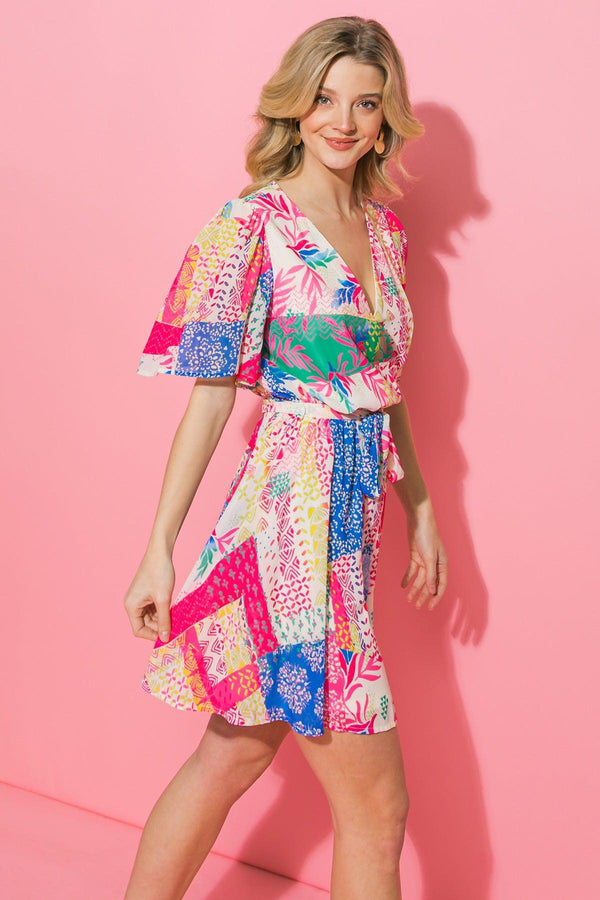 MAKING MOVES WOVEN MINI DRESS.