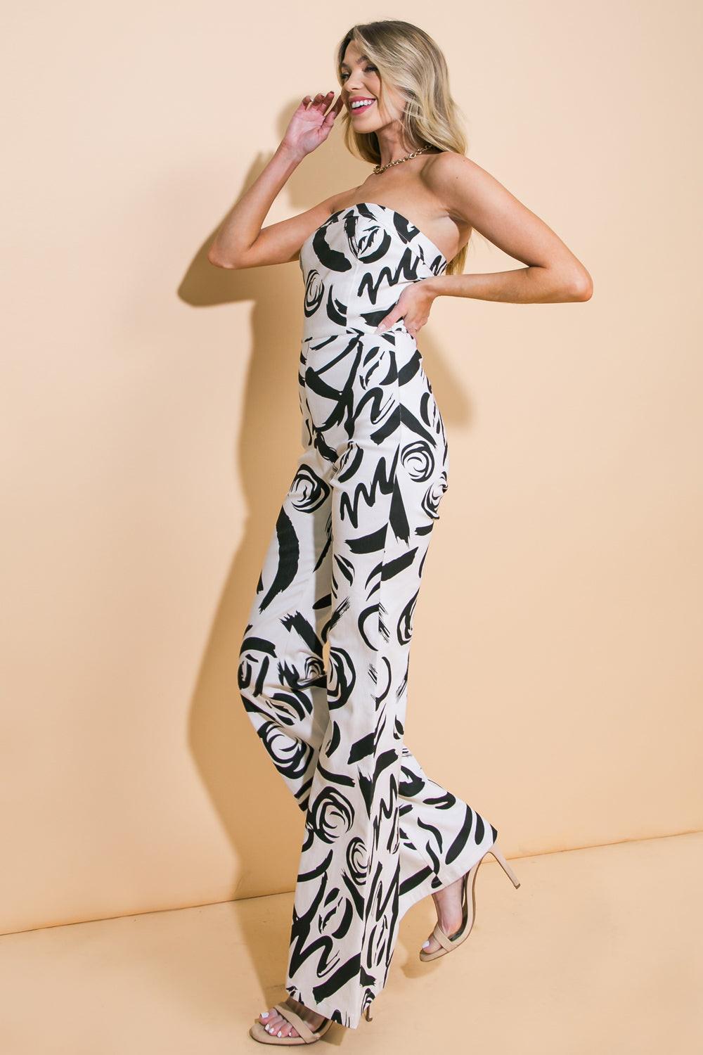 BIG AMBITIONS TWILL JUMPSUIT.