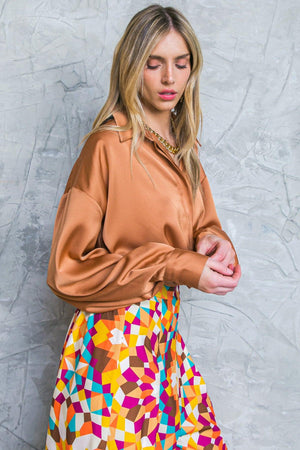 GRACEFUL MOVEMENTS WOVEN TOP.